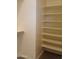 Large closet with custom built-in shelving at 21026 E Calle Luna Ct, Queen Creek, AZ 85142