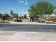 Community playground with shaded areas and play equipment at 21039 E Poco Calle St, Queen Creek, AZ 85142