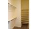 Walk-in closet with double hanging rods and shelving at 21039 E Poco Calle St, Queen Creek, AZ 85142