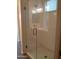 Frameless glass shower enclosure in modern bathroom at 21039 E Poco Calle St, Queen Creek, AZ 85142