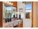 Bathroom with double vanity and wood cabinets, mountain view at 26639 N 132Nd St, Scottsdale, AZ 85262