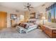 Primary bedroom with a comfortable bed and dresser at 26639 N 132Nd St, Scottsdale, AZ 85262