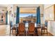 Formal dining room with antique wooden table and chairs at 26639 N 132Nd St, Scottsdale, AZ 85262