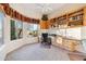 Bright home office features built-in shelves and large windows at 26639 N 132Nd St, Scottsdale, AZ 85262