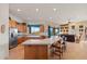 Open kitchen with island and views into living room at 26639 N 132Nd St, Scottsdale, AZ 85262
