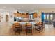 Kitchen with breakfast bar, wooden cabinets, and views at 26639 N 132Nd St, Scottsdale, AZ 85262