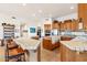 Large kitchen with a breakfast bar and tile countertops at 26639 N 132Nd St, Scottsdale, AZ 85262
