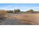 Large lot with a wagon and desert landscape at 26639 N 132Nd St, Scottsdale, AZ 85262