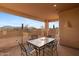 Covered patio with seating area and mountain views at 26639 N 132Nd St, Scottsdale, AZ 85262