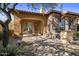 Covered patio with dining table and chairs, adjacent to built-in grill at 32051 N 73Rd Pl, Scottsdale, AZ 85266