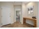 Bright hallway with access to bedroom and office area at 32051 N 73Rd Pl, Scottsdale, AZ 85266
