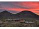 Community view showcasing pool, clubhouse, and mountain backdrop at 32962 N 131St Dr, Peoria, AZ 85383