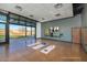 Yoga studio with large mirrors and outdoor access at 32994 N 131St Dr, Peoria, AZ 85383