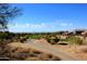 Walking path alongside a lush green golf course at 3650 N Barron --, Mesa, AZ 85207