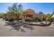 Two story home with circular driveway and desert landscaping at 38065 N Cave Creek Rd # 40, Cave Creek, AZ 85331