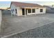 Backyard view with covered patio and gravel at 5153 W Wescott Dr, Glendale, AZ 85308