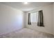 Bright bedroom with neutral wall colors and carpet flooring at 6783 S Lake Forest Dr, Chandler, AZ 85249