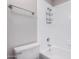 Bathroom with tub, shower caddy, and white tile at 850 S River Dr # 2069, Tempe, AZ 85281