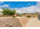 Landscaped backyard with pergola and patio area at 8611 E Cholla St, Scottsdale, AZ 85260