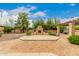 Outdoor patio with fireplace and pergola, perfect for entertaining at 8611 E Cholla St, Scottsdale, AZ 85260