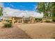 Large backyard with gravel and mature trees at 8611 E Cholla St, Scottsdale, AZ 85260