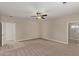 Spacious bedroom with neutral decor and access to a bathroom at 8611 E Cholla St, Scottsdale, AZ 85260