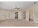 Bedroom with double doors leading to the balcony and walk-in closet at 8611 E Cholla St, Scottsdale, AZ 85260