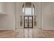 Grand entryway with high ceilings, tile flooring, and ornate doors at 8611 E Cholla St, Scottsdale, AZ 85260