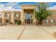 Entrance of a luxurious home with stone and arched entryway at 8611 E Cholla St, Scottsdale, AZ 85260