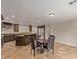 Open kitchen with breakfast nook and island at 8611 E Cholla St, Scottsdale, AZ 85260