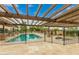 Resort-style pool and spa with pergola and fence at 8611 E Cholla St, Scottsdale, AZ 85260