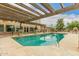 Sparkling pool with tiled steps and pergola at 8611 E Cholla St, Scottsdale, AZ 85260