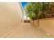 Gravel side yard with gated access at 8611 E Cholla St, Scottsdale, AZ 85260