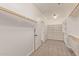 Large walk-in closet with built in shelves and hanging rods at 8611 E Cholla St, Scottsdale, AZ 85260