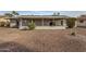 House exterior view, showcasing the back of the house and backyard at 13311 W Castle Rock Dr, Sun City West, AZ 85375