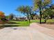 Open green space with paved pathway at 18128 N Bell Pointe Blvd, Surprise, AZ 85374