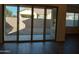 Sliding glass doors lead to a spacious backyard at 21024 E Poco Calle St, Queen Creek, AZ 85142