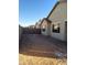 Large backyard with block wall and sandy terrain at 21024 E Poco Calle St, Queen Creek, AZ 85142