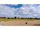 Community park with grassy areas, volleyball court, and playground at 21024 E Poco Calle St, Queen Creek, AZ 85142