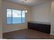 Bright dining room with wood floors and built-in cabinetry at 21024 E Poco Calle St, Queen Creek, AZ 85142