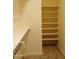 Walk-in closet with hanging rods and additional shelving at 21024 E Poco Calle St, Queen Creek, AZ 85142