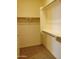 Spacious walk-in closet with hanging rods and shelving at 21024 E Poco Calle St, Queen Creek, AZ 85142