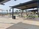 Relaxing community space with shaded picnic tables at 22874 E Alyssa Rd, Queen Creek, AZ 85142