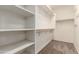 Spacious closet with shelving and hanging rods at 24460 N Plum Rd, Florence, AZ 85132