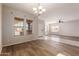 Bright dining area with hardwood floors and an open concept design at 24460 N Plum Rd, Florence, AZ 85132