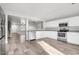 Modern kitchen featuring white cabinets and stainless steel appliances at 2511 E Meadow Creek Way, San Tan Valley, AZ 85140