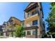 Three-story building showcasing contemporary architecture and landscaping at 300 N Gila Springs Blvd # 179, Chandler, AZ 85226