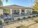 Luxury home with pool, patio, and covered seating at 36073 N Stoneware Dr, Queen Creek, AZ 85140