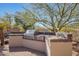 High-end outdoor grill with stone counters at 3701 E Sat Nam Way, Cave Creek, AZ 85331