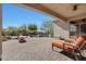 Outdoor patio with fire pit, comfortable seating and a view of the pool at 3701 E Sat Nam Way, Cave Creek, AZ 85331